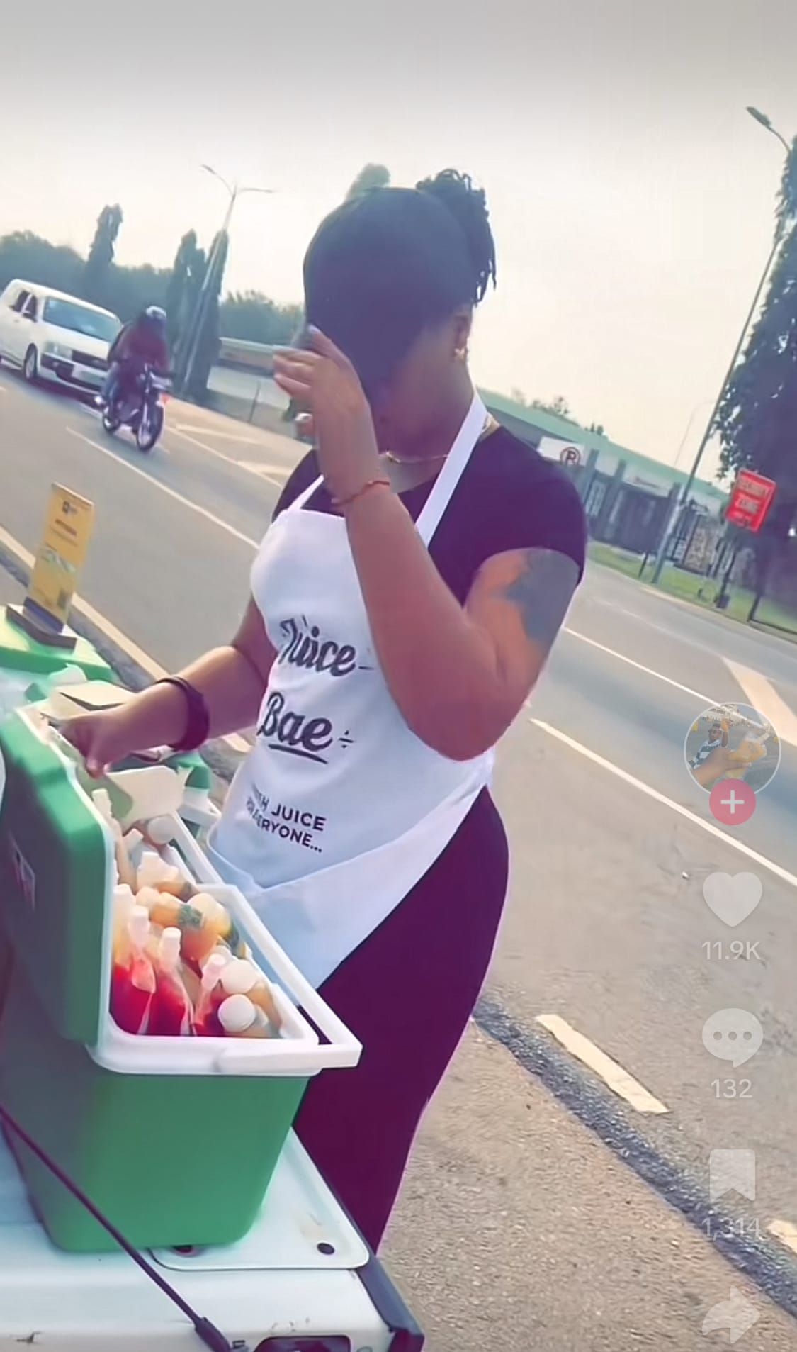 Shatta Michy sells fruit juice by the roadside