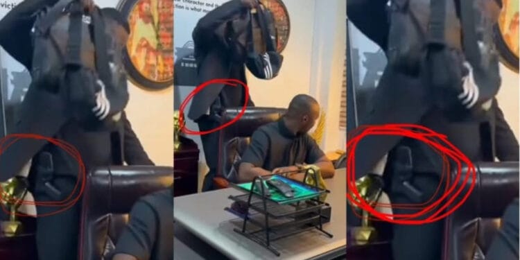VIDEO: Malik Basintale Carries Gun-Wielding Personal Bodyguard To YEA Office