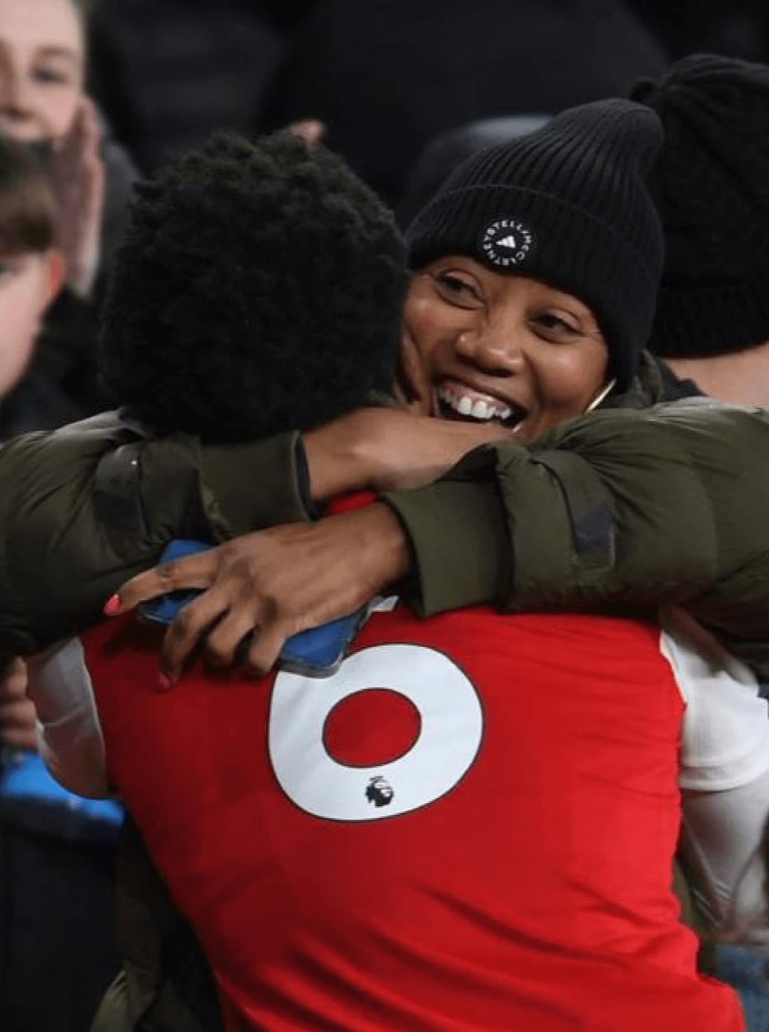 Myles Lewis mother celebrates him during Arsenal match